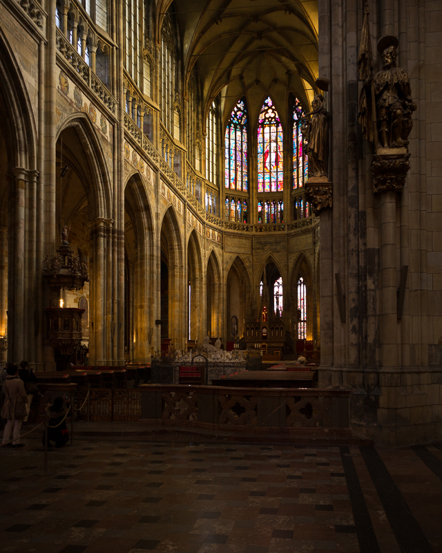 View down the aisles of the cathedral, with the play of afternoon light through the windows.
