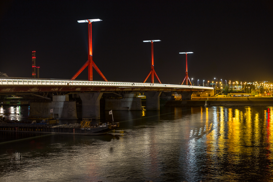 A modern bridge, spanning the Danube.