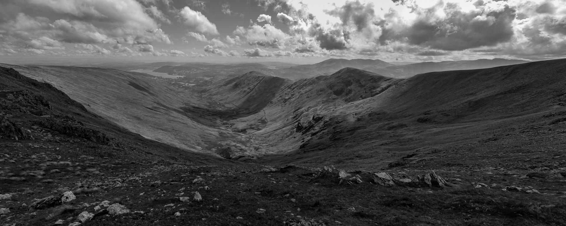 The view from the top of St Sunday's Crag, Grasmere township is to the right, and Grasmere lake in the distance.